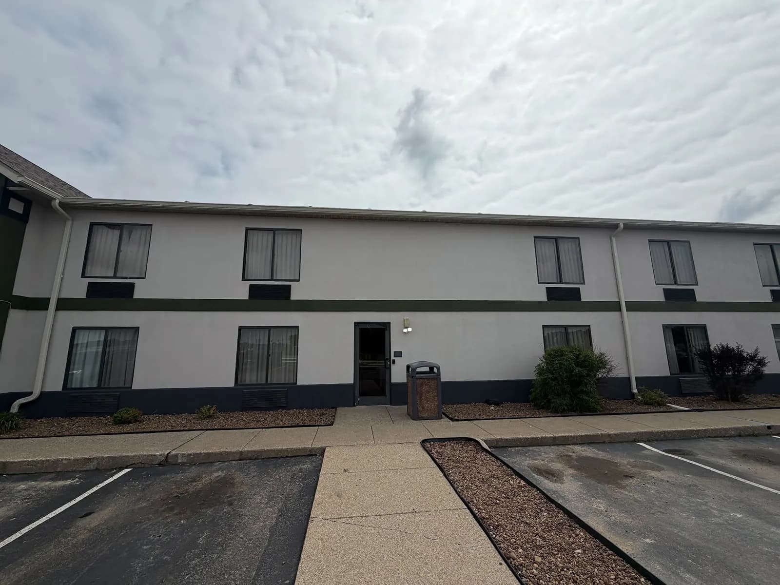 Two-story commercial building with freshly painted exterior