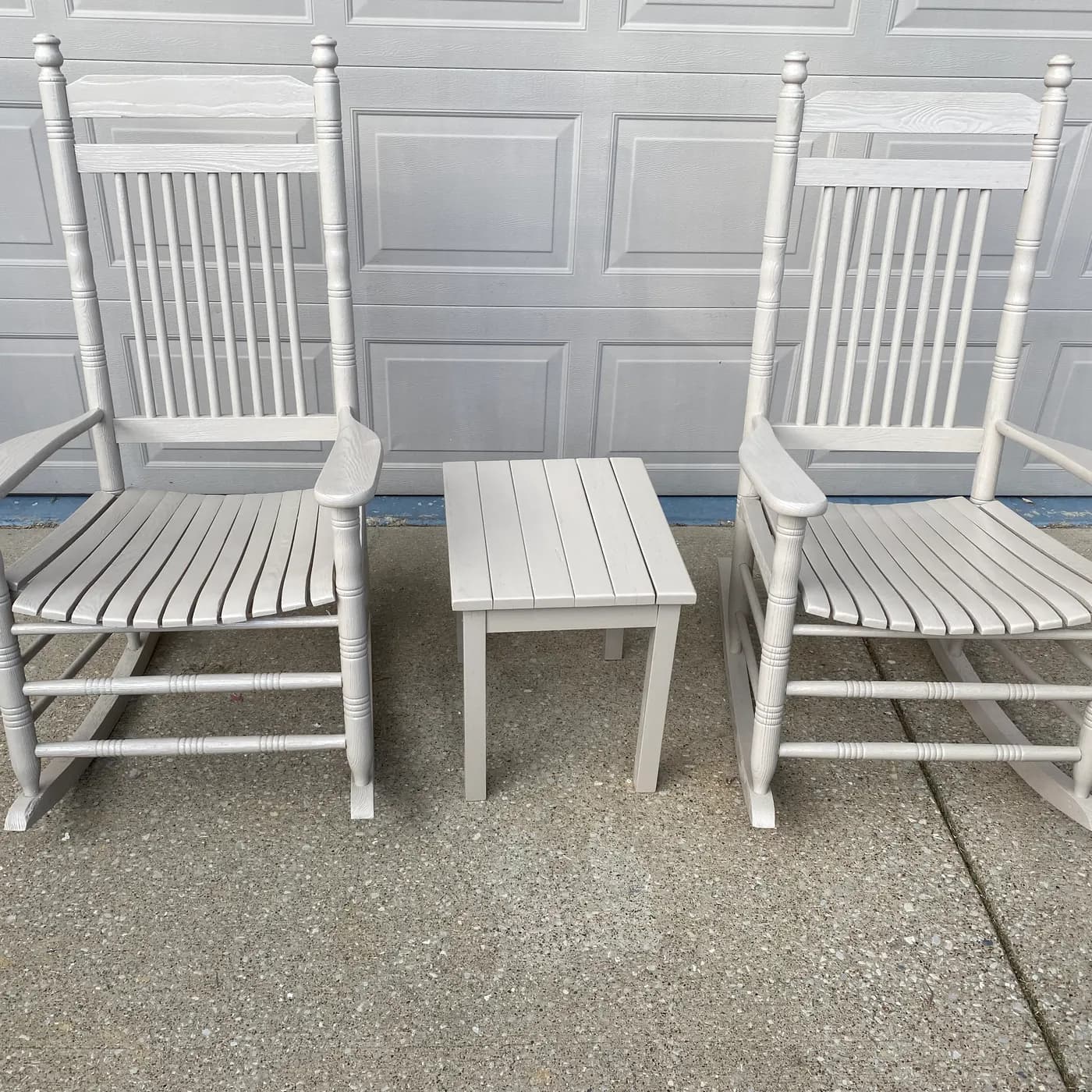 Two rocking chairs and a side table refinished in white